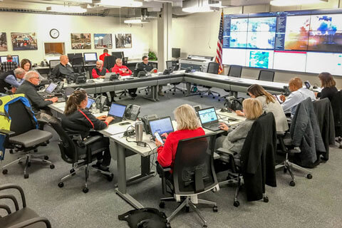 Volunteers coordinate emergency plans.